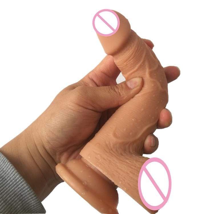 Image of a lifelike dildo with a suction cup base for hands-free pleasure.